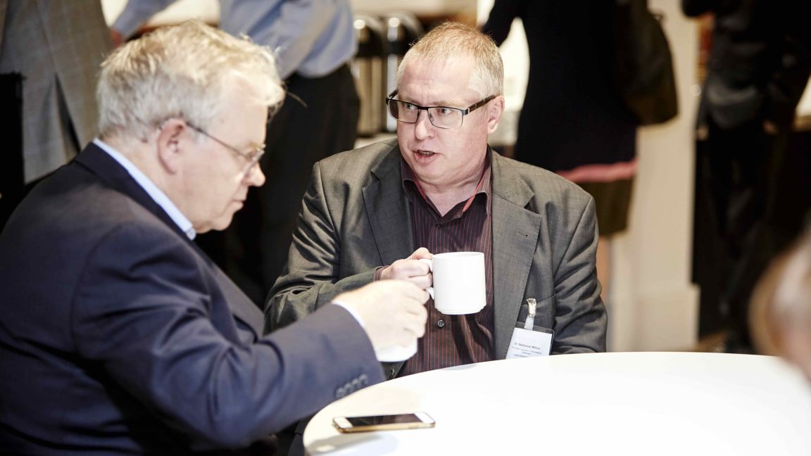 A picture of two innovation professionals discussing the Translate secondment scheme